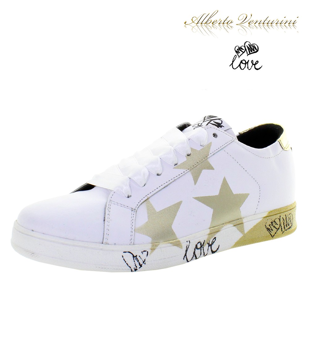 gold sneakers with stars